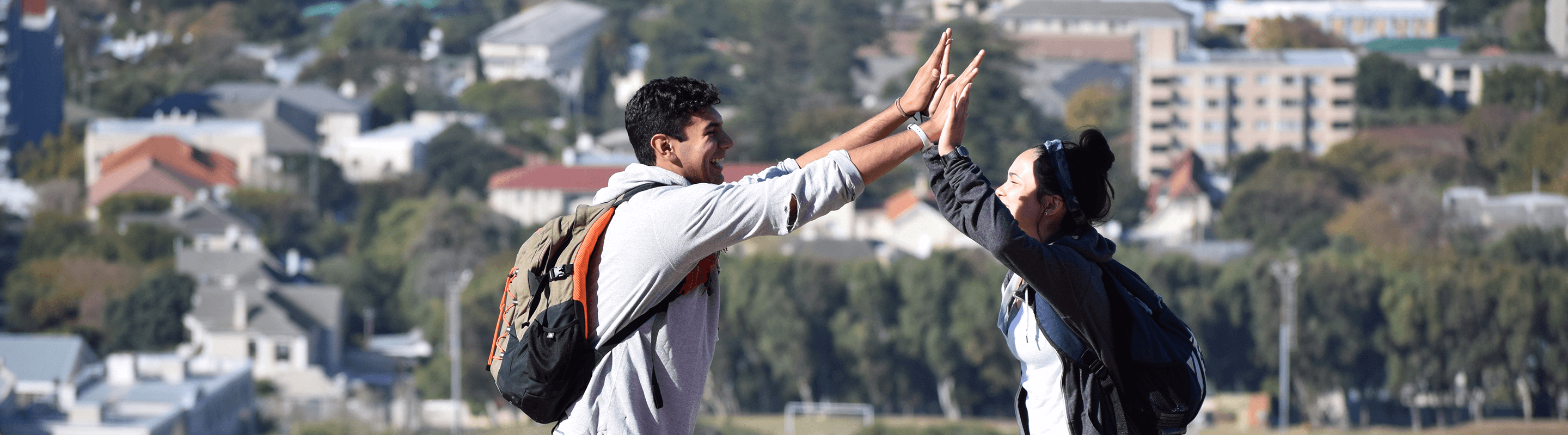 Students high-fiving