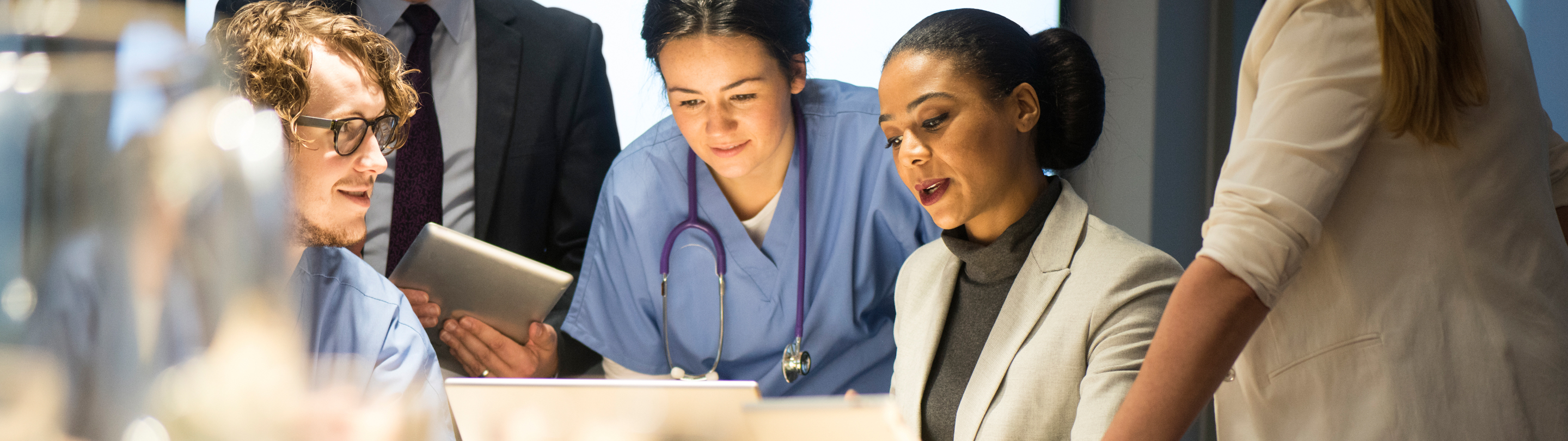 Doctor and nurses discussing research