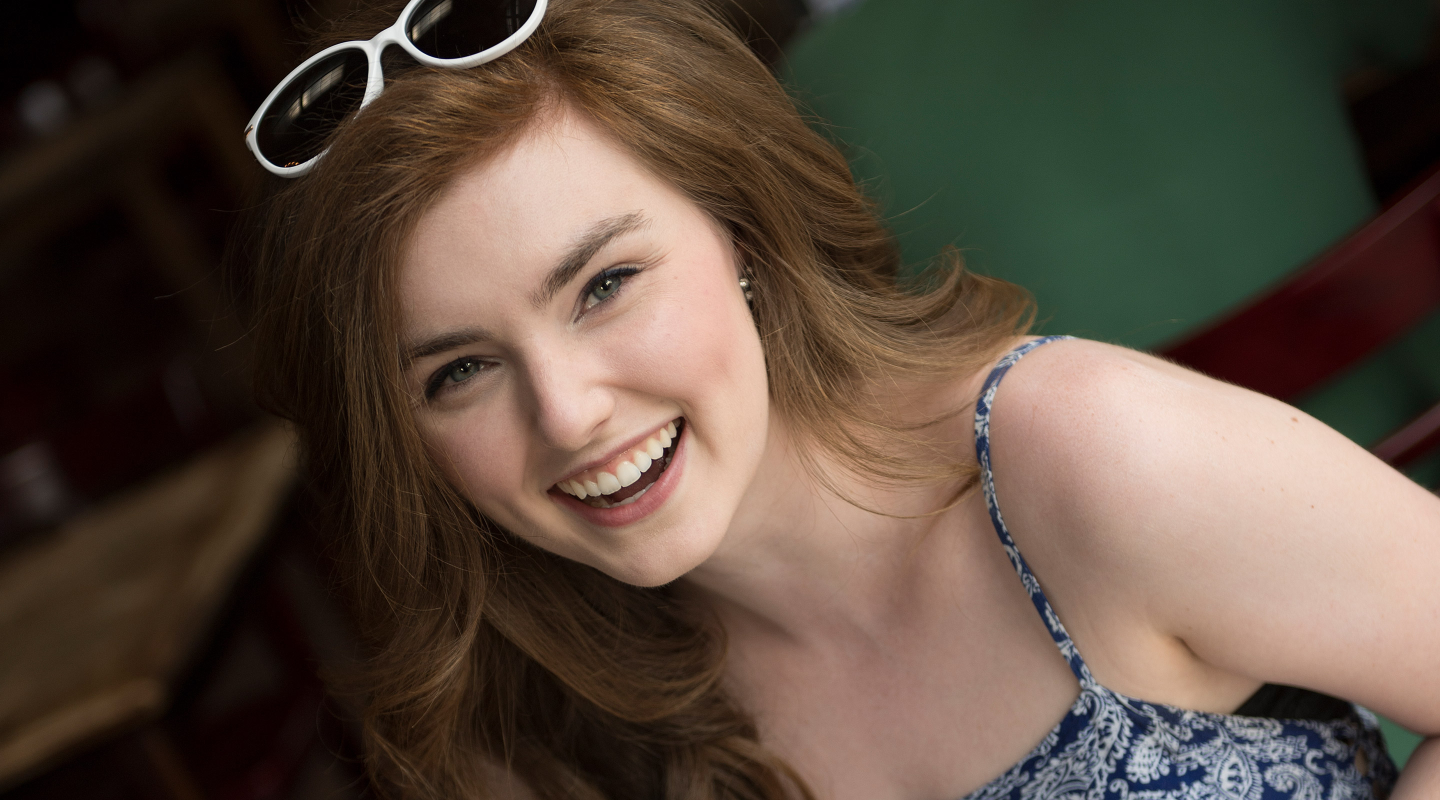 Ellen Egitton student laughing over coffee table