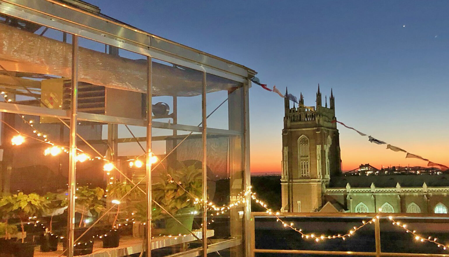 View of Holy Name from rooftop Azby Greehouse at night