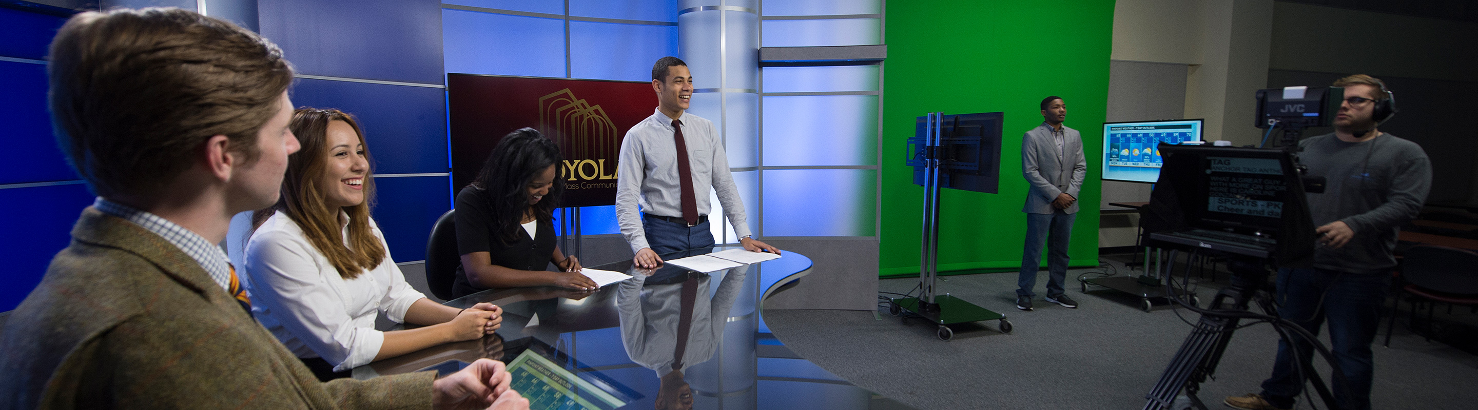 Students in broadcast center filming