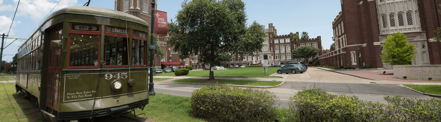 Loyola's campus with a passing streetcar.