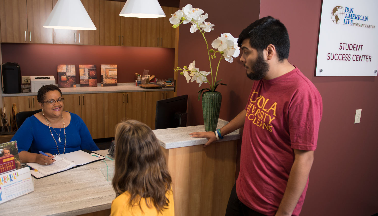 Students chatting with Student Success Center Representative