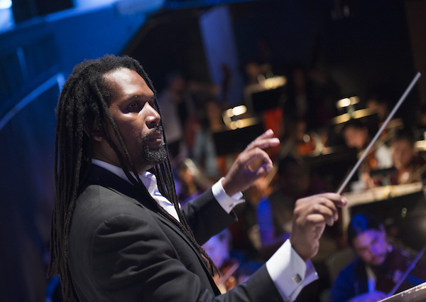 Dr. Montes conducting the Loyola Orchestra